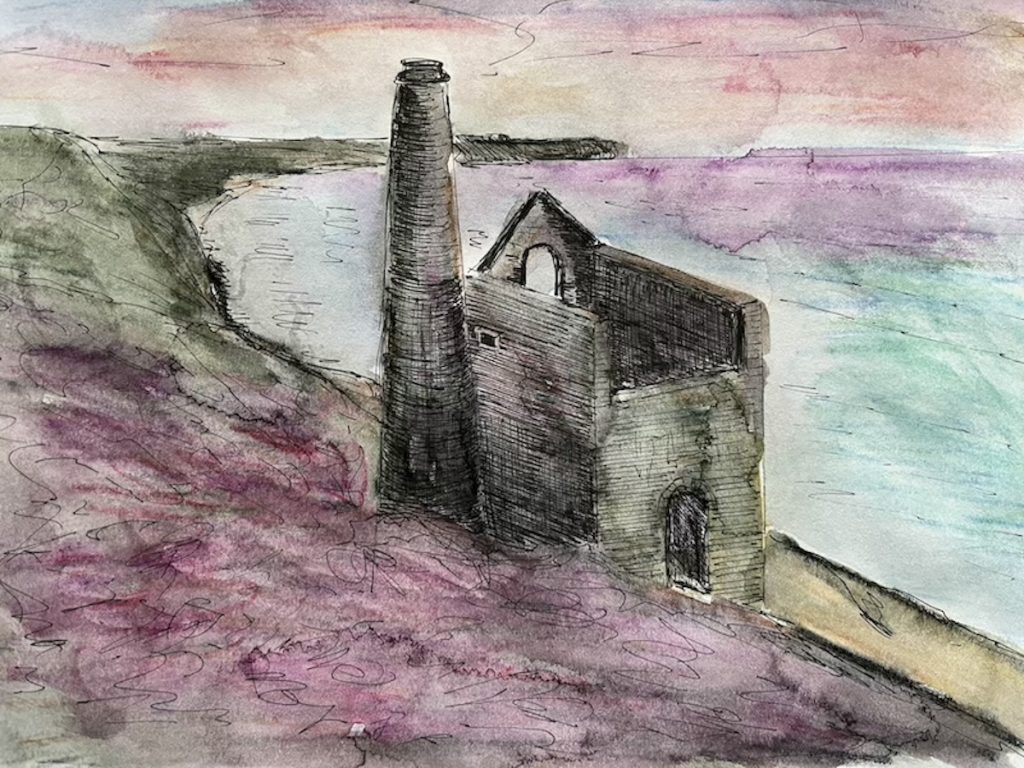 a disused tin mine on the cliff at sunset