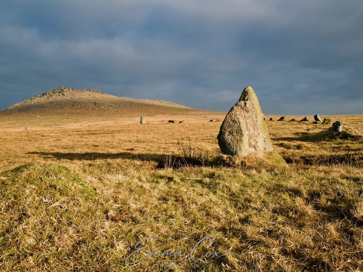 A photograph of Fernacre stone circle in view of Rough Tor, Bodmin Moor.