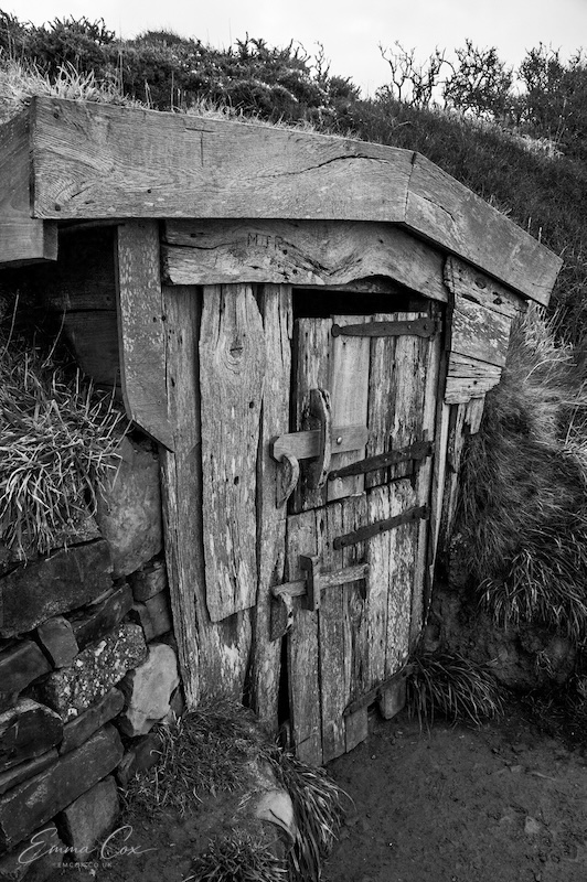 a hut made of shipwrecked timber